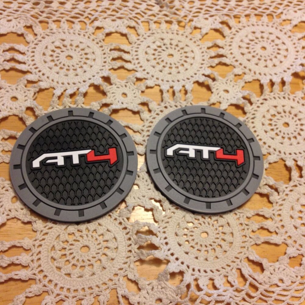 AT4 car coasters, new